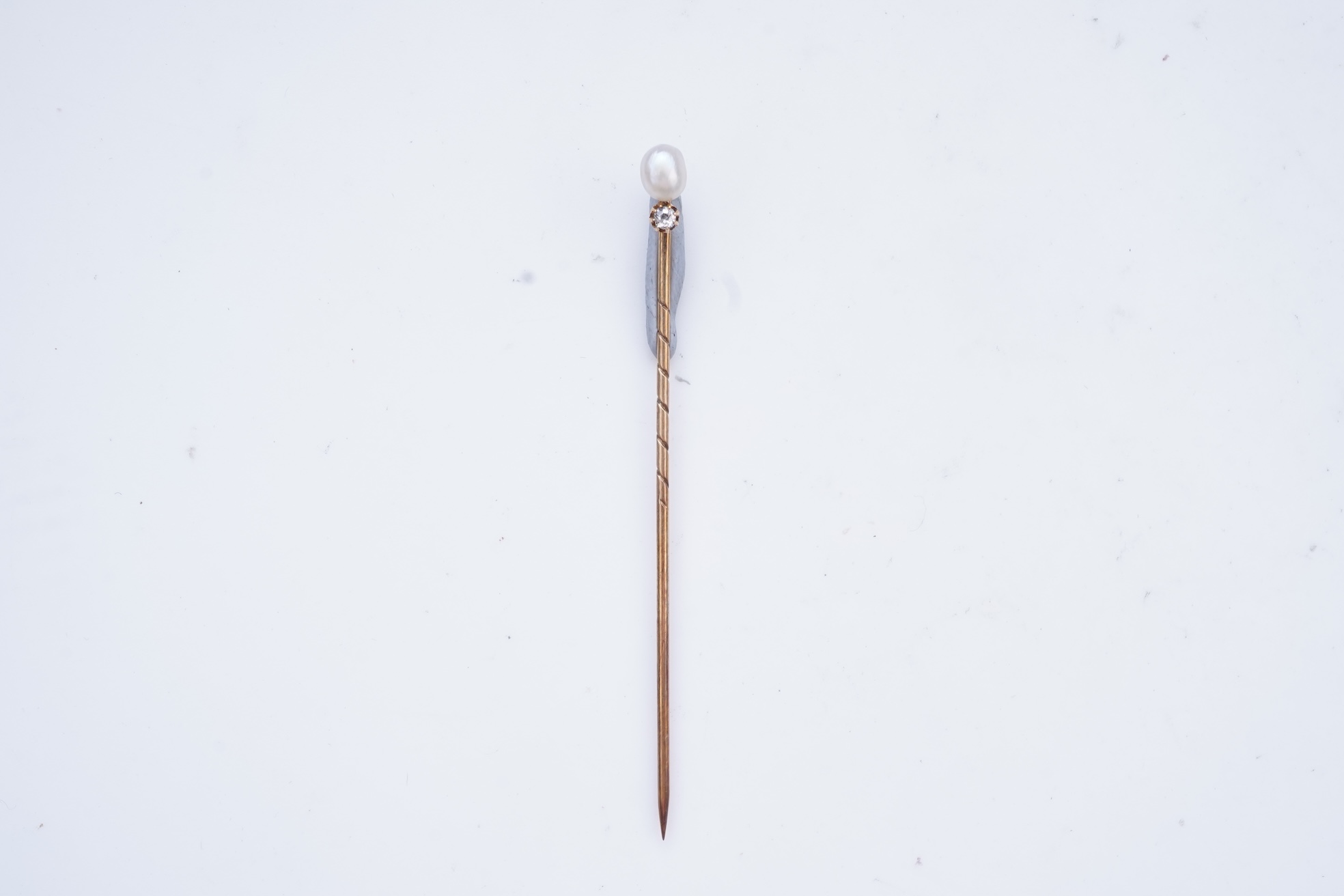 Two cameos and a stick pin, 19th century